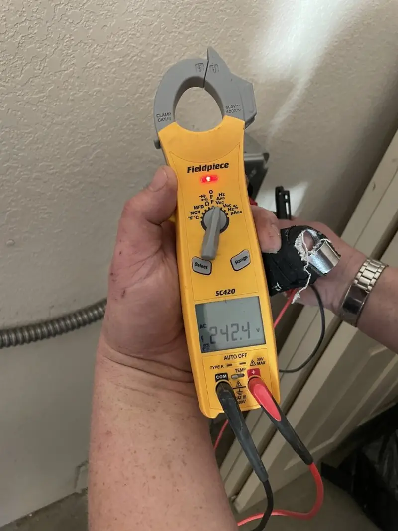Voltage testing with clamp meter during Ceiling Fan Installation in Sunnyvale